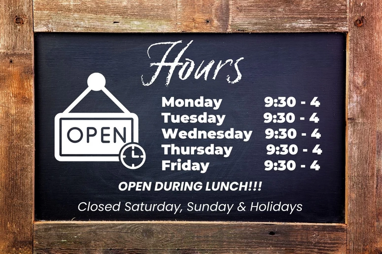 Paterson Photography / First Choice Photolab Hours sign