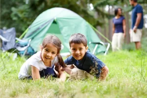 Family out enjoying camping